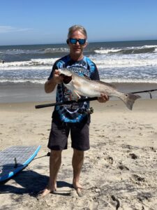 Red drum catches on the beach Obx. 